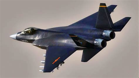 shenyang j-35 taxiing with folded wings aboard simulated carrier deck