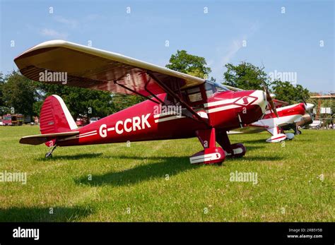 Side-by-side comparison of Cessna 120 and Luscombe Silvaire parked at a fly-in event