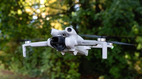 side-by-side view of dji air 3s and mini 4 pro on travel gear layout