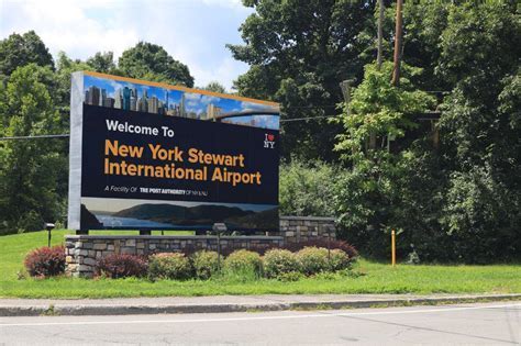 Signage for New York Stewart International Airport (SWF) with control tower