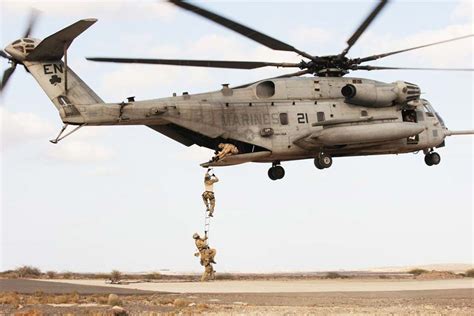 Sikorsky CH53E Super Stallion heavy lift helicopter carrying external cargo
