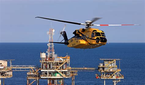 Sikorsky S-92 hovering above offshore oil rig