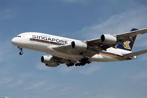 Singapore Airlines A380 taking off over Melbourne skyline