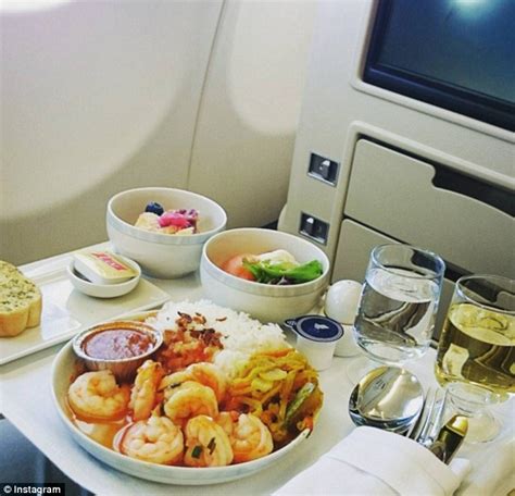 Singapore Airlines First Class gourmet dining and champagne service
