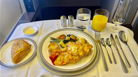 Singapore Airlines first class gourmet dining lobster thermidor plated service