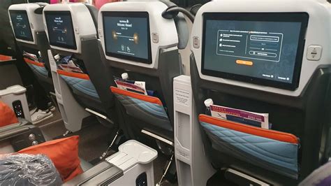 Singapore Airlines premium economy seat KrisWorld screen