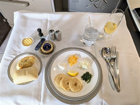 Singapore Airlines Suites caviar service and premium dining experience