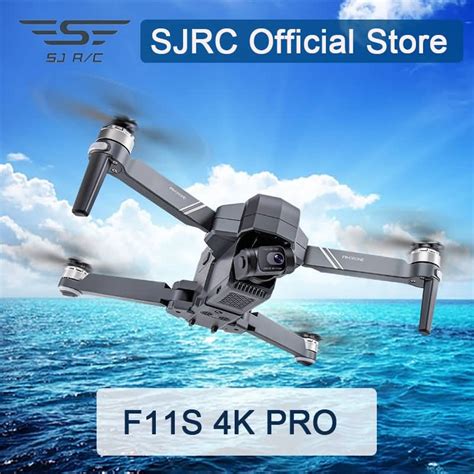 sjrc f11 mini drone flying high over coastal cliffline