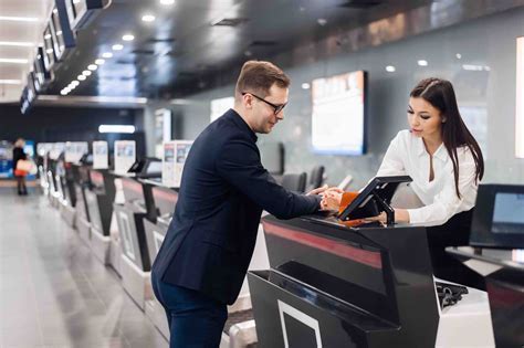 Sky Airline check-in counter signage showing baggage rules and fees