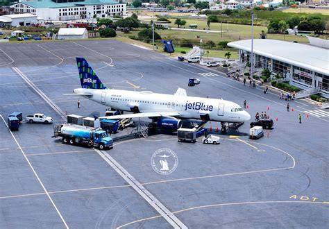 sky high dominicana aircraft at robert l. bradshaw international airport saint kitts