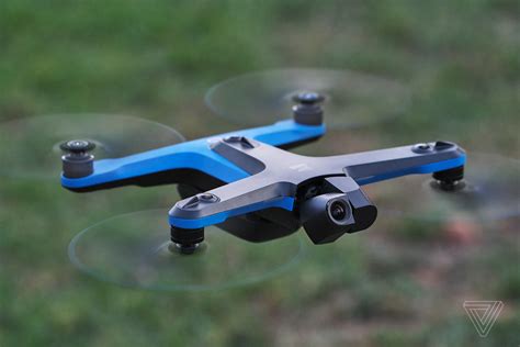Skydio 2 drone autonomously navigating through a treelined path