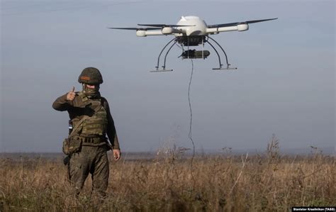 small quadcopter drone demonstration at military testing site
