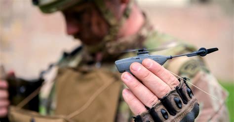 soldier training with black hornet nano using handheld controller