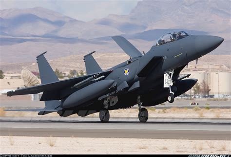 South Korean F-15K on a tarmac, showcasing GE engines and weaponry