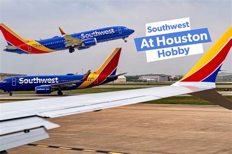 Southwest Airlines aircraft at Houston Hobby Airport with downtown skyline in distance