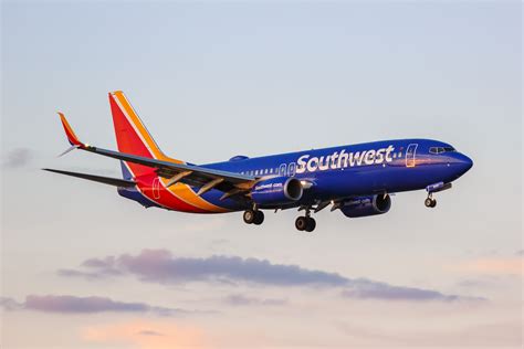 Southwest Airlines Boeing 737 aircraft with distinctive livery at airport gate
