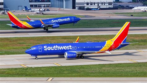 Southwest Airlines Boeing 737 MAX 8 fleet at Dallas Love Field with older 737 aircraft in background
