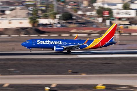 Southwest Boeing 737 MAX at Baltimore/Washington International Airport with sunrise backdrop