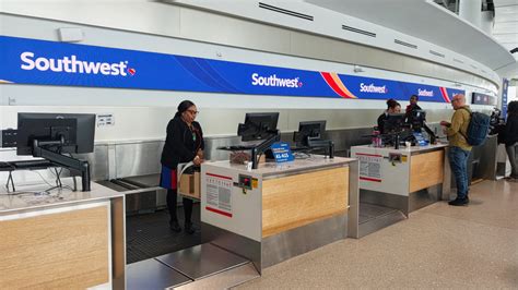 Southwest check-in counters at BWI Airport bustling with travelers