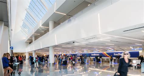 Southwest Terminal 1 interior at LAX with minimal waiting areas and modern design