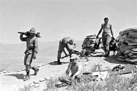 Soviet troops facing Mujahideen guerrillas during Afghan occupation