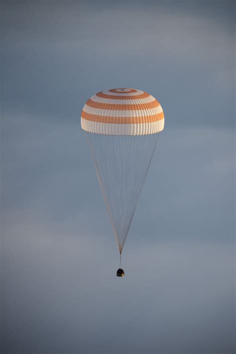 Soyuz capsule touchdown in remote Kazakhstan grasslands
