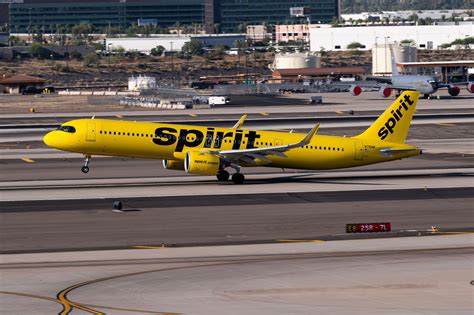 Spirit Airlines Airbus A321 aircraft at airport gate during uncertain future