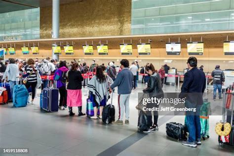Spirit Airlines aircraft boarding international passengers at El Dorado International Airport in Bogotá
