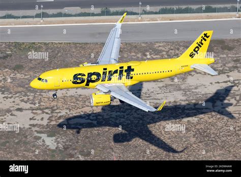 Spirit Airlines airport gate operations yellow livery