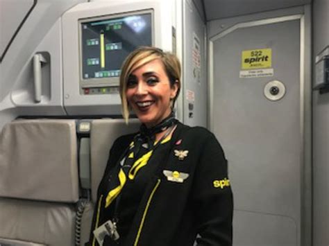 Spirit Airlines flight attendants boarding Airbus aircraft before passenger departure