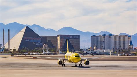 Spirit Airlines taxiing on runway at Harry Reid International Airport in Las Vegas