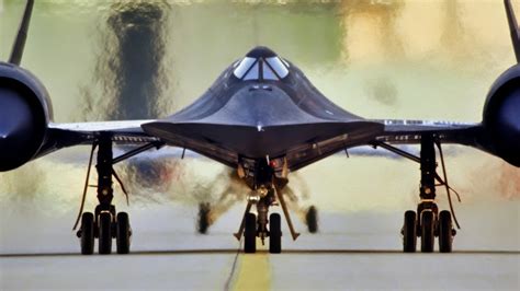 SR-71 Blackbird on the ground with visible fuel servicing and titanium airframe