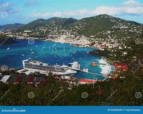 st. thomas harbor with cruise ships and southwest aircraft overhead