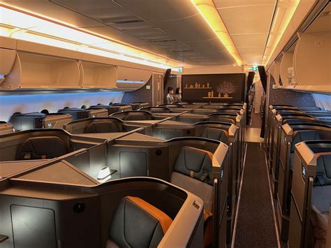 Starlux A350 Business Class Elements suite showcasing seat features and privacy door