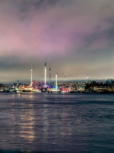 Stockholm skyline with illuminated hotels and historic buildings at twilight