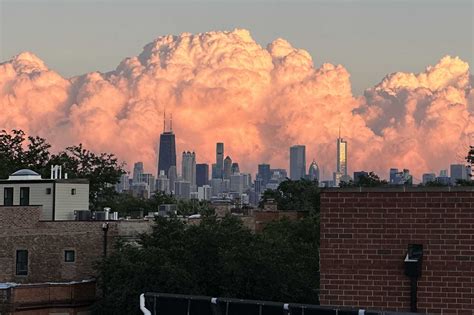 storm clouds over Chicago O’Hare causing flight backlog
