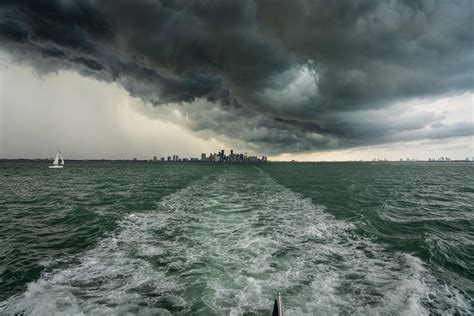 Storm clouds over Miami International Airport during widespread flight disruptions