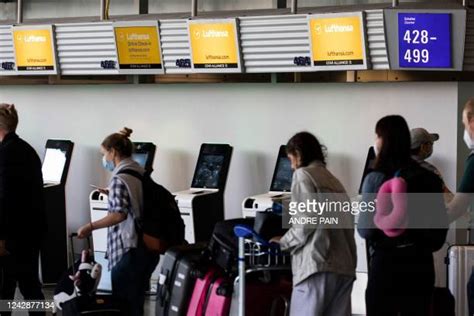 stranded international travelers awaiting rebooking assistance at Frankfurt Airport