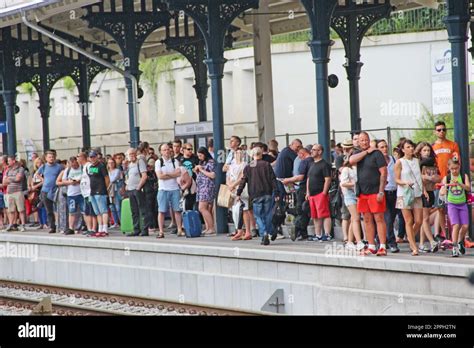 Stranded passengers waiting for special train at Ponneri station during block hours