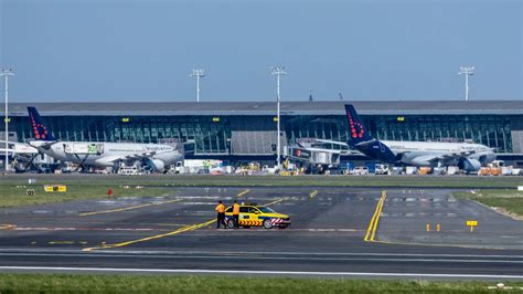 stranded travelers at brussels charleroi airport during july 2025 strike