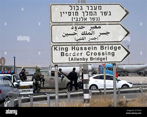 stranded travelers queue at Allenby Bridge crossing amid Tel Aviv airport closure