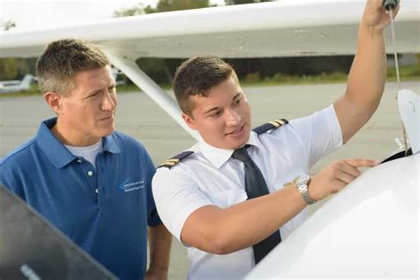 student pilot performing night stop-and-go landings under CFI supervision