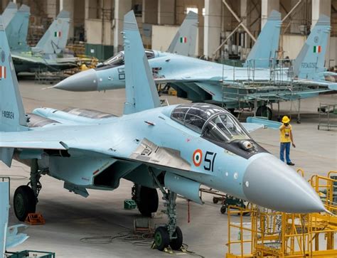 su-30mki parked under temporary shelter at indian air base