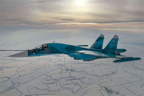 su-34 bomber in flight over conflict zone in eastern ukraine