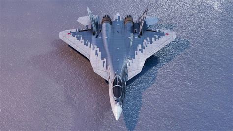 Su-57E airborne with weapons bay doors open during live demonstration