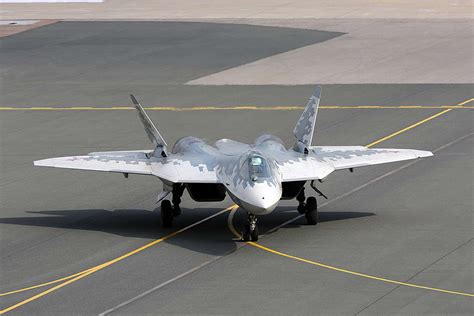 Su-57M1 flying in formation with S-70 Okhotnik stealth UCAV in joint mission tests