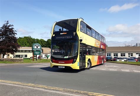 Summer visitors boarding a DalesBus in Upper Wharfedale