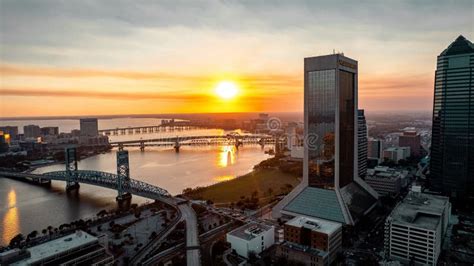 sunset aerial shot of St. Johns River winding through Jacksonville