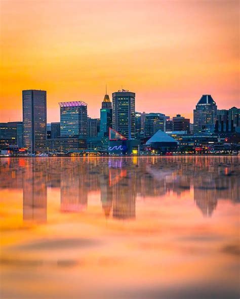 Sunset tour over Baltimore skyline with city lights below