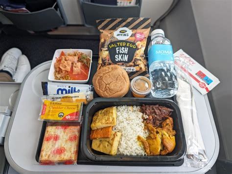 sustainable gourmet in-flight meal served in air france la première on singapore to paris route